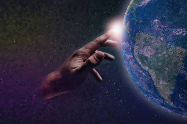 istock Forefinger touches a earth pixel in infinite space. Mixed Media. Concept matrix universe. 1087839394
