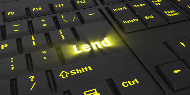 istock yellow glowing Lend key on black keyboard 1087851826