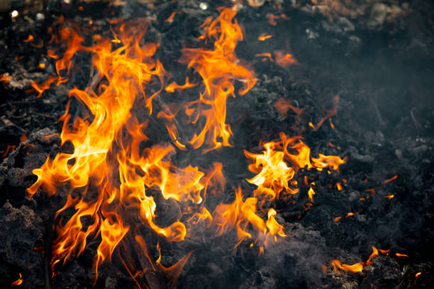 istock Fire flame burning garbage to air pollution in industry 1087852558
