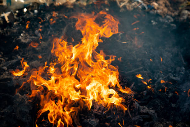 istock Fire flame burning garbage to air pollution in industry 1087852654
