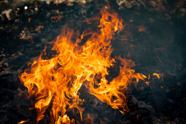 istock Fire flame burning garbage to air pollution in industry 1087852682
