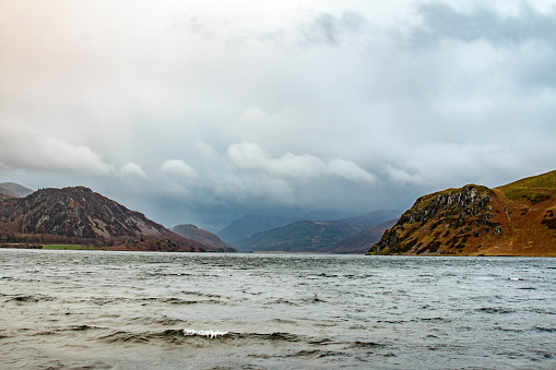 Ennerdale Water is surrounded by graggy peaks. With Bowness Knot to the right and Anglers Crag to the left, the choppy water on this winters day was churning up. The clouds were rolling across the sky at quite a pace.