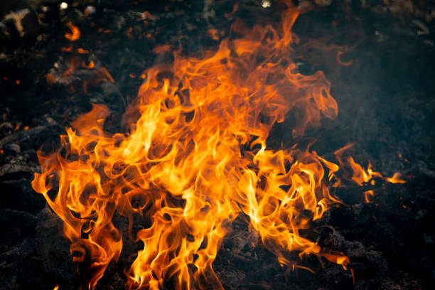 istock Fire flame burning garbage to air pollution in industry 1087852700