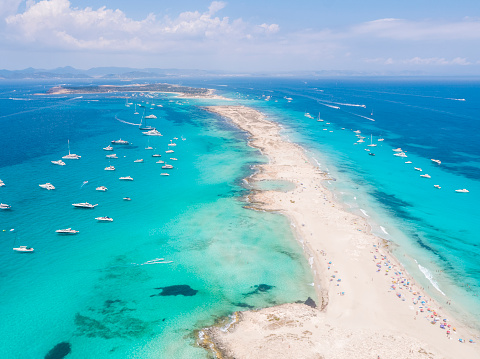Vista aérea de Formentera de yates anclados y aguas de color turquesa photo