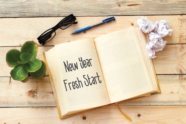 istock new year, fresh start on notebook on wooden table 1087858490