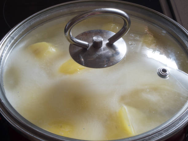 istock Cleaned potatoes in a saucepan in boiling water 1087860714