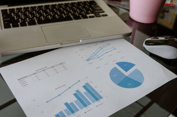 istock laptop with charts and graphs 1087861918