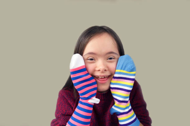 istock Beautiful girl smiling with socks 1087865410