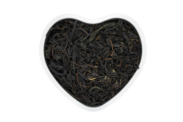istock Fireweed tea with thyme herb, close up, heart-shaped. Great willowherb or rosebay herbal healthy drink, black tea, macro. 1087866934