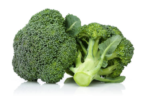 Fresh green broccoli on white background Fresh green broccoli isolated on white background. Studio shot broccoli stock pictures, royalty-free photos & images