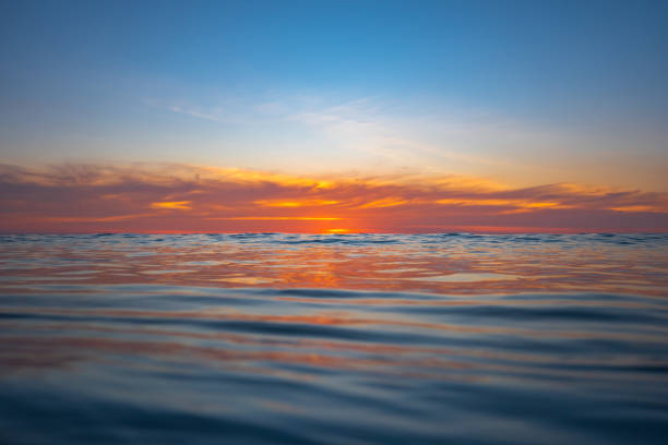 istock beautiful sunset above the sea 1087874292