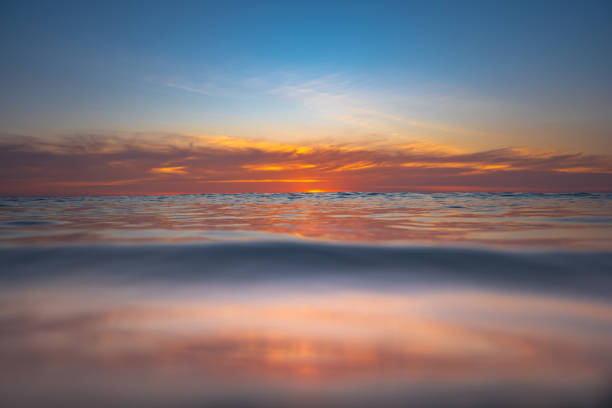 istock big waves in beautiful sunset 1087874298