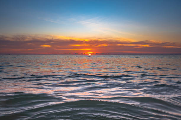istock beautiful sunset above the sea 1087874302