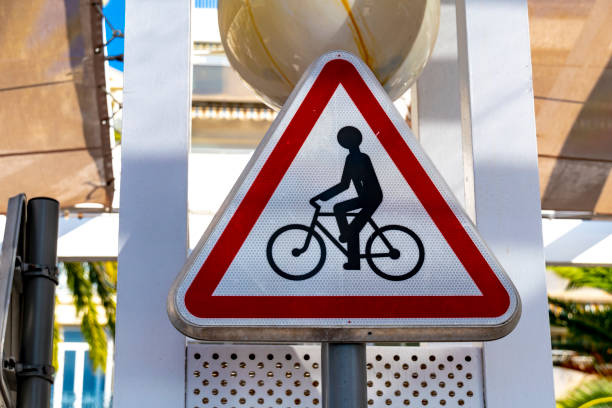 istock Road sign warning of crossing cyclists. 1087890232