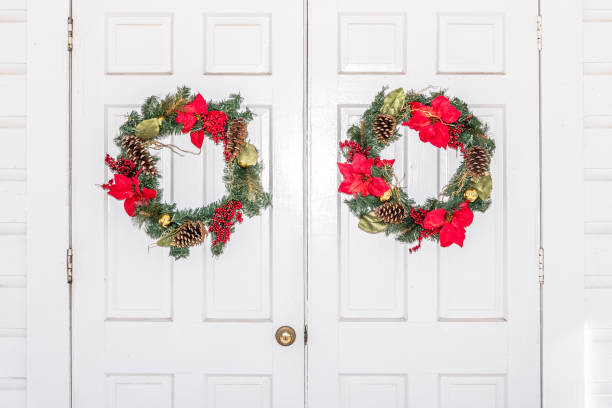 istock Simple and elegant christmas decor in old white door 1087897974