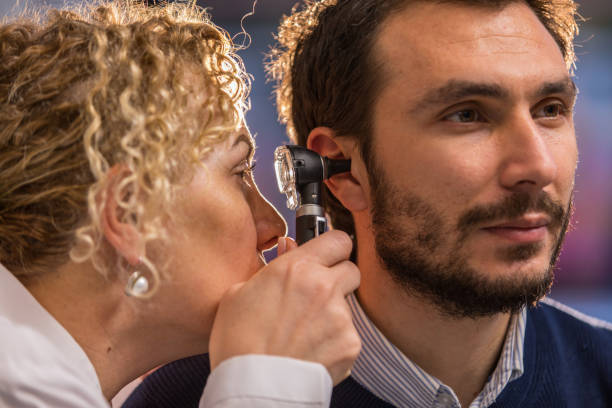 istock Audiometry exam - Hearing test - Audiologist - Audiometer - Ear test 1087898630