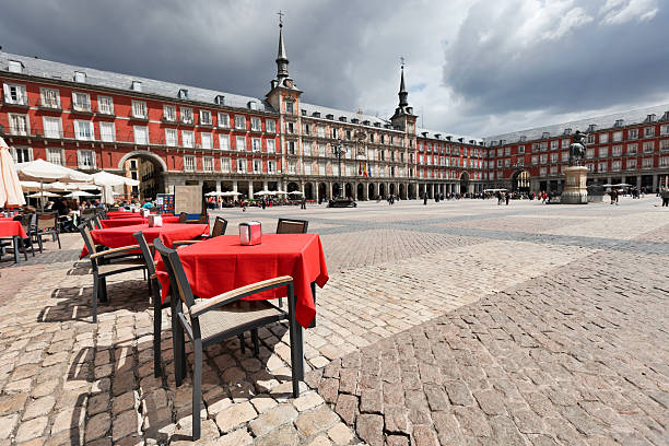 istock Cafe tables with red tableclothes in Plaza Mayor. Madrid. 108790004