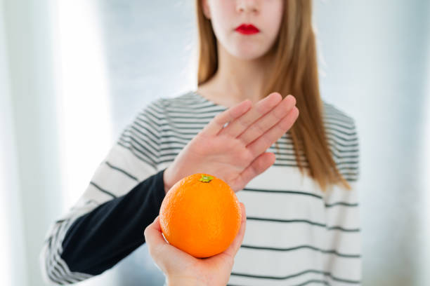 istock Citrus fruit allergy concept - food intolerance 1087904572