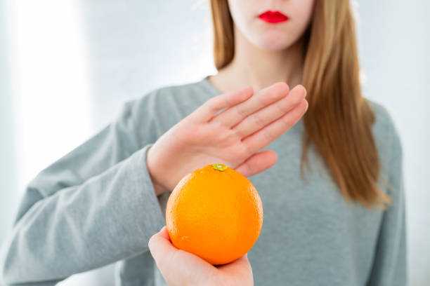 istock Citrus fruit allergy concept - food intolerance 1087904594