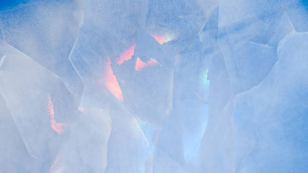 Ice texture with colorful iridescent multi-colored reflections stock photo