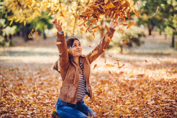 istock Throwing leaves in the air 1087906396