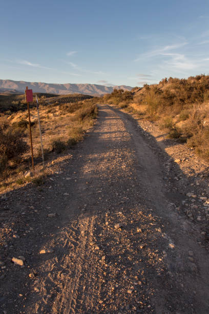 istock old dirt road in the desert 1087906660