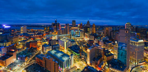 Skyline of Detroit Michigan at sunset aerial Skyline of Detroit Michigan at sunset aerial detroit michigan stock pictures, royalty-free photos & images
