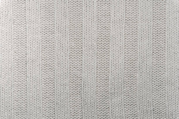 istock Background, texture - surface of a wool knitted fabric close up 1087912024