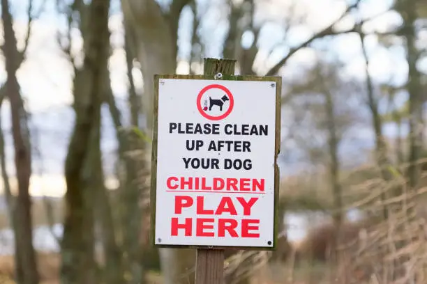 Clean up after dog children play here sign uk