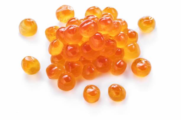 Red caviar or fish roe eggs. Red caviar or fish roe eggs on white background.  Clipping path. caviar stock pictures, royalty-free photos & images