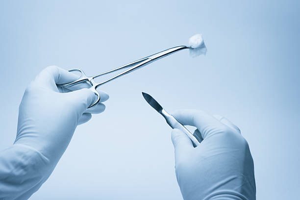 istock hands of surgeon and assistent nurse during surgery 108791611