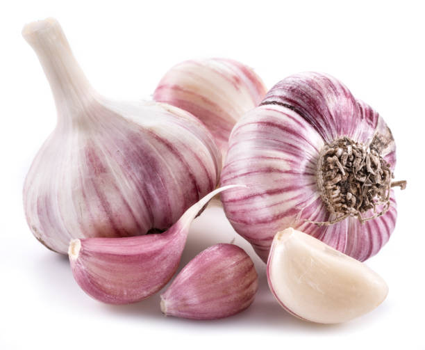 istock Garlic bulb and garlic cloves. 1087925558
