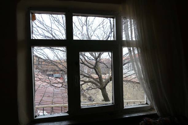 istock Outside view from the window of an old adobe house 1087934606