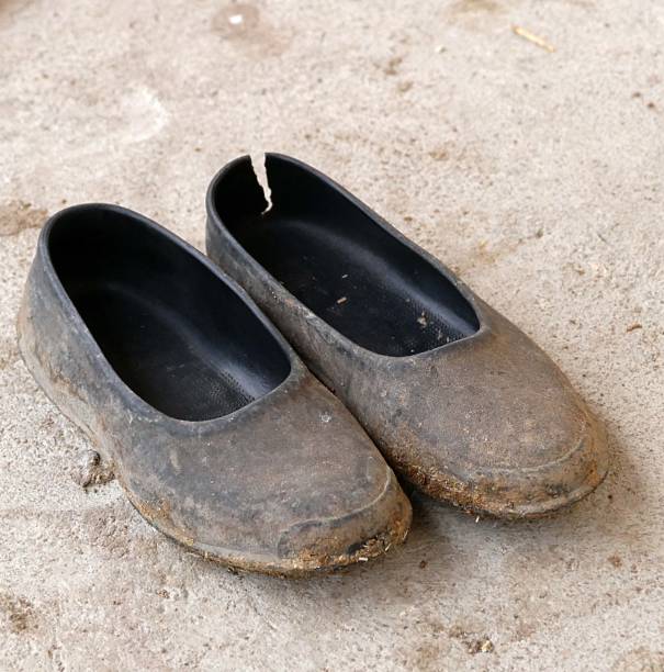 istock old used rubber women's shoes, 1087934612