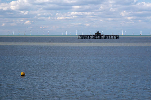 istock Wind Turbines out at sea 1087934940