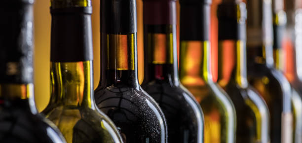 istock Line of wine bottles. 1087936218