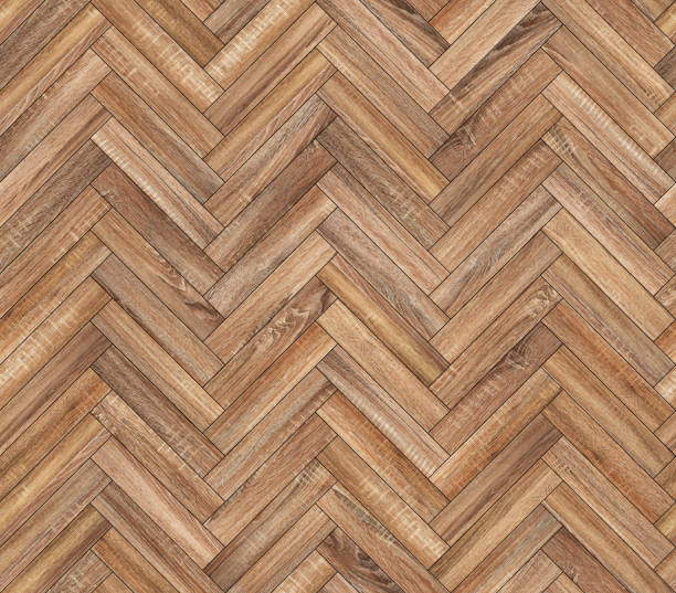 istock Herringbone natural parquet seamless floor texture 1087944554