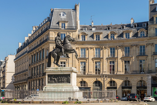 View of the Statue of Louis XIV located at Place des Victoires near to the Palais Royale in Paris city, France.