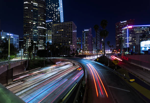 istock Light Blurs of Freeway Traffic at Night in DTLA 1087971716