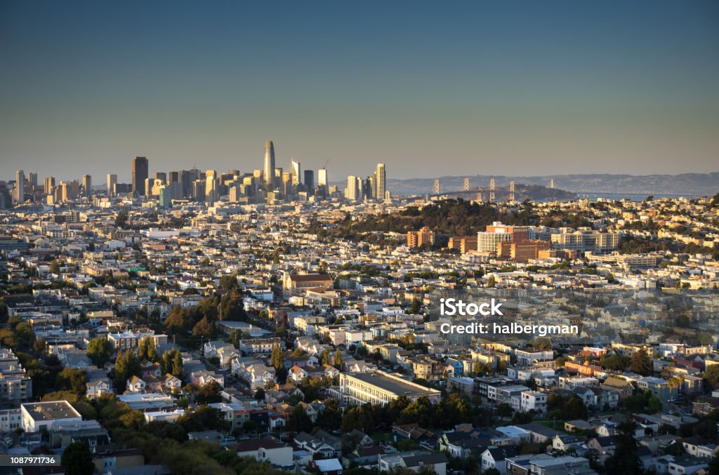 San Francisco Cityscape - Evening Cityscape of San Francisco, looking out over the Mission from Bernal Hill towards the Financial District and the Bay Bridge. Mission District Stock Photo
