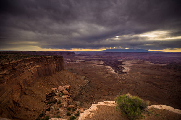 istock Cloudy Sunrise in Canyonlands National Park 1087971756