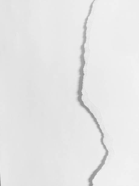 istock pieces of torn paper texture background, copy space. 1087981034