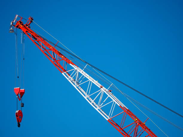 istock A Giant Red Climbing Crane with blue sky background 1087986800