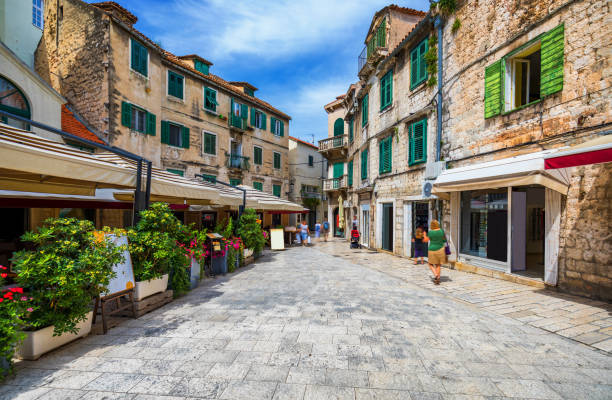 Street in Split historical center, Croatia. Beautiful square of the old town of Split in Croatia. Old stone street of Split historic city, Dalmatia, Croatia Street in Split historical center, Croatia. Beautiful square of the old town of Split in Croatia. Old stone street of Split historic city, Dalmatia, Croatia split croatia stock pictures, royalty-free photos & images