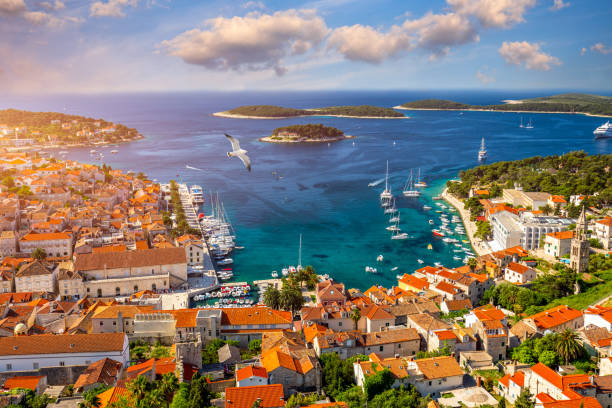 Amazing historic town of Hvar aerial view, Dalmatia, Croatia. Island of Hvar bay aerial view, Dalmatia, Croatia. Harbor of old Adriatic island town Hvar. Popular touristic destination of Croatia. Amazing historic town of Hvar aerial view, Dalmatia, Croatia. Island of Hvar bay aerial view, Dalmatia, Croatia. Harbor of old Adriatic island town Hvar. Popular touristic destination of Croatia. hvar photos stock pictures, royalty-free photos & images