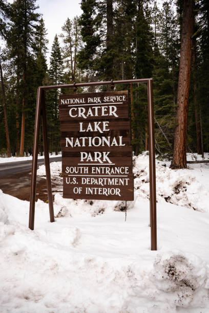 istock Sign Marking Crater Lake National Park Boundary 1088019200