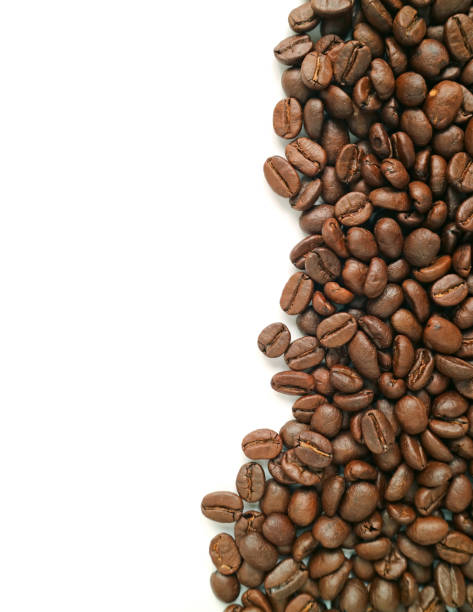 istock Vertical image of roasted coffee beans isolated on white background with free space for text and design 1088042214