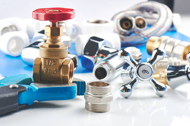 istock Plumbing parts, accessories and tools on a blue white background. 1088043712