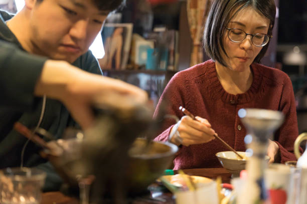 istock Man and woman eating ramen noodle 1088047340