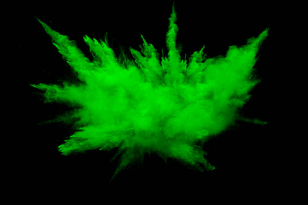 istock Green color powder explosion cloud on black background.Green dust splash on dark background. 1088048686